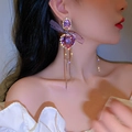 Detail of purple heart crystal earring with polka dot bow and rhinestone tassels on model - Purple Heart Gem Tassel (31#)