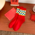 Festive red mid-calf cotton socks with checkered cuffs and yellow pom-pom accents - One Size / Colorful Grid