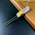 Detail of amethyst crystal hair pin with handmade gold wire wrapping on a metal U-fork - Rose Quartz