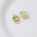 Macro detail of gold irregular frame pendant with pink rectangular gem for DIY jewelry - Style 20