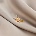 Golden butterfly non-pierced ear cuff with sparkling marquise zircons on beige silk - Butterfly