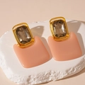 Detail of geometric resin stud earrings with gold frame and faceted brown gemstone - Coffee Square Style (Silver Needle)