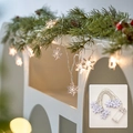Snowflake LED string lights with hollow white design and transparent battery box for Christmas - Iron Snowflake