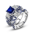 Luxe bruidsringset met blauwe saffier en geëmailleerde hartjes gegraveerde banden - US 5 / Blauw