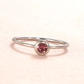 Minimalist stainless steel ring with a round pink birthstone in a bezel setting - US Size 7 / Steel-Light Purple (Jun)
