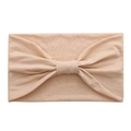 Detail of nude pink stretch cotton yoga headband featuring a central knot design - Nude Pink