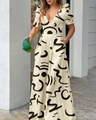 Detail of V-neck printed jumpsuit with puff sleeves and black abstract pattern - S / Apricot Print