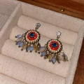 Detailed macro of vintage bohemian earrings with red beads and blue rhinestone accents - Multicolor Beaded Round (14#)