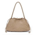 Beige hand-woven leather bucket bag with drawstring closure and crossbody strap - Nut Apricot