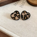 Detail of heart-shaped leopard print earrings with flocking texture on a linen book - 16# Silver Needle - Heart - Black - Leopard Fluff