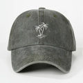 Detailed close-up of white palm tree embroidery on dark gray washed cotton baseball cap - Army Green