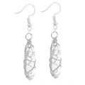 Detailed macro view of white turquoise hexagonal pendant earrings with silver wire wrapping - Wire Wrapped Hexagonal Prism Earrings / Silver White Turquoise Earrings