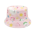 Detailed close-up of a pink reversible cotton sun hat with cute cartoon dog and star prints - 52-54cm / Light Pink
