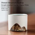 Elegant Zen ceramic tea cup in matte white featuring artistic dark mountain ink pattern - Straight Cup / Elegant White