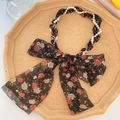 Floral print headband with white pearl chain and black ribbon bow detail - Black with Big White Flower