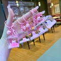 Lot de porte-clés Kapibara cochon rose avec sable mouvant et clochettes pour sacs - Style Fermoir Mousqueton / Style de cube de capybara (Mélange aléatoire)