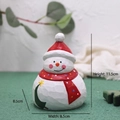 Christmas snowman figurine with red hat and scarf, featuring a painted green tree detail - Large Snowman