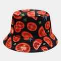 Detailed close-up of a black reversible bucket hat with vibrant tomato and parsley prints - Black Base Tomato Slice Print (26# Color)