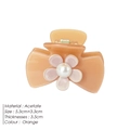 Orange acetate hair claw clip with camellia flower and pearl detail for women - Pink