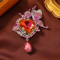 Luxurious butterfly brooch with pink crystal heart and teardrop tassel on brown silk - Pink