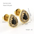 Close-up of 18K gold plated zircon teardrop earrings with dimensions 11mm x 9mm - Black Zirconia