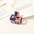 Macro detail of a large shark hair claw clip featuring a vibrant American flag star pattern - US Flag Clip - 5cm Square