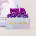 Detail showing purple glitter Feliz Cumpleaños candle with stylish gradient gift box - Galaxy Gradient Purple Blue Feliz Cumpleaños