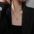 Minimalist silver double layered heart necklace with sleek snake chain on model - Double Layer Heart Necklace (Silver)