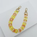 Detail of yellow-orange gradient acrylic chunky chain with gold metal spring buckles - 30cm Phone Chain / Translucent Orange Yellow