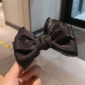 Elegante pinza de pelo con lazo de satén negro para peinado de moño mujer - Negro