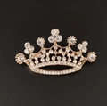 Close-up of elegant crown brooch with sparkling rhinestones and rose gold plating - Multi-Rhinestone Crown