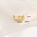 Macro view of a 14K gold narwhal pendant on white fabric with size and weight details - Narwhal (H-11794)