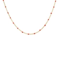 Minimalist gold link necklace with vibrant red bead accents on a clean white backdrop - Necklace / Red