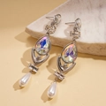 Detail of silver drop earrings with iridescent crystals and pearls on a stone base - Silver (925 Sterling Silver Earring Post)