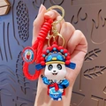 Panda keychain in blue Peking Opera costume with woven rope and golden metal ring - Peking Opera Dan Style