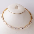 Elegant gold necklace with oval-cut white zircon gemstones on a white mannequin - Water Drop Zirconia Style C / Gold