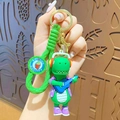 Green cartoon dinosaur keychain with headphones and guitar on a green braided strap - Sports Dinosaur - Green Violin