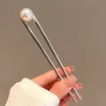 Elegant silver U-shaped hair pin featuring a large lustrous white pearl accent - Double Prong Pearl Silver