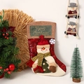 Detail of red Christmas stocking with 3D snowman figurine and Merry Christmas embroidery - Vintage Snowman Style