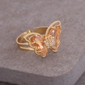 Macro view of 18K gold butterfly ring with amber teardrop stones and white diamonds - Adjustable Open / Peach