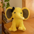 Cute yellow plush elephant toy with a black bow and soft gray inner ears for baby comfort - Yellow/Black Bow