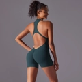 Macro shot of dark green yoga jumpsuit with open back design and scrunch butt detail - S / Top And Bottom / Wood Green