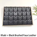 Detailed top view of 24-compartment jewelry display tray with khaki frame and black leather - Khaki + Black Brushed Leather