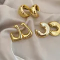 3-pair set of polished gold geometric hoop earrings on elegant champagne silk fabric - 1# Gold (3-Pair Set)