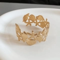 Golden open cuff bracelet featuring interconnected starfish and seashell ocean designs - Ocean Creature Combination (5#)