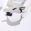 Elegant crane bird acetate hair claw clip with black white and red accents on white desk - Crane