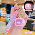 Pink TV-shaped glowing keychain with silicone wristband and cute animal interior figure - Mini Glowing TV-Pink