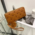Brown long zip wallet with heart embroidery, woven texture and plush pompom charm - Brown