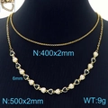 Collar doble dorado con colgantes de corazones en esmalte blanco y negro sobre busto - Color Oro Negro Corazón Negro Blanco (KN233672-Z)