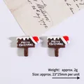 Brown resin Merry Christmas sign charm with snow and Santa hat for DIY crafts - Merry Christmas Sign